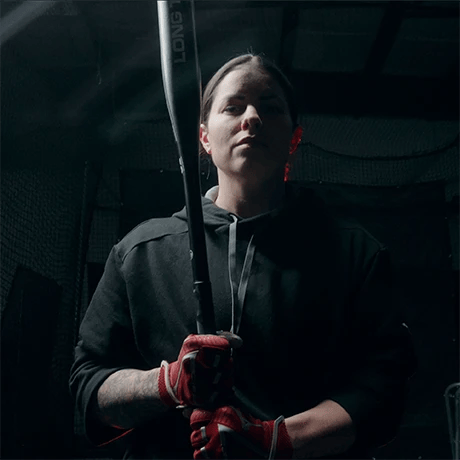 woman with a baseball bat at OGX